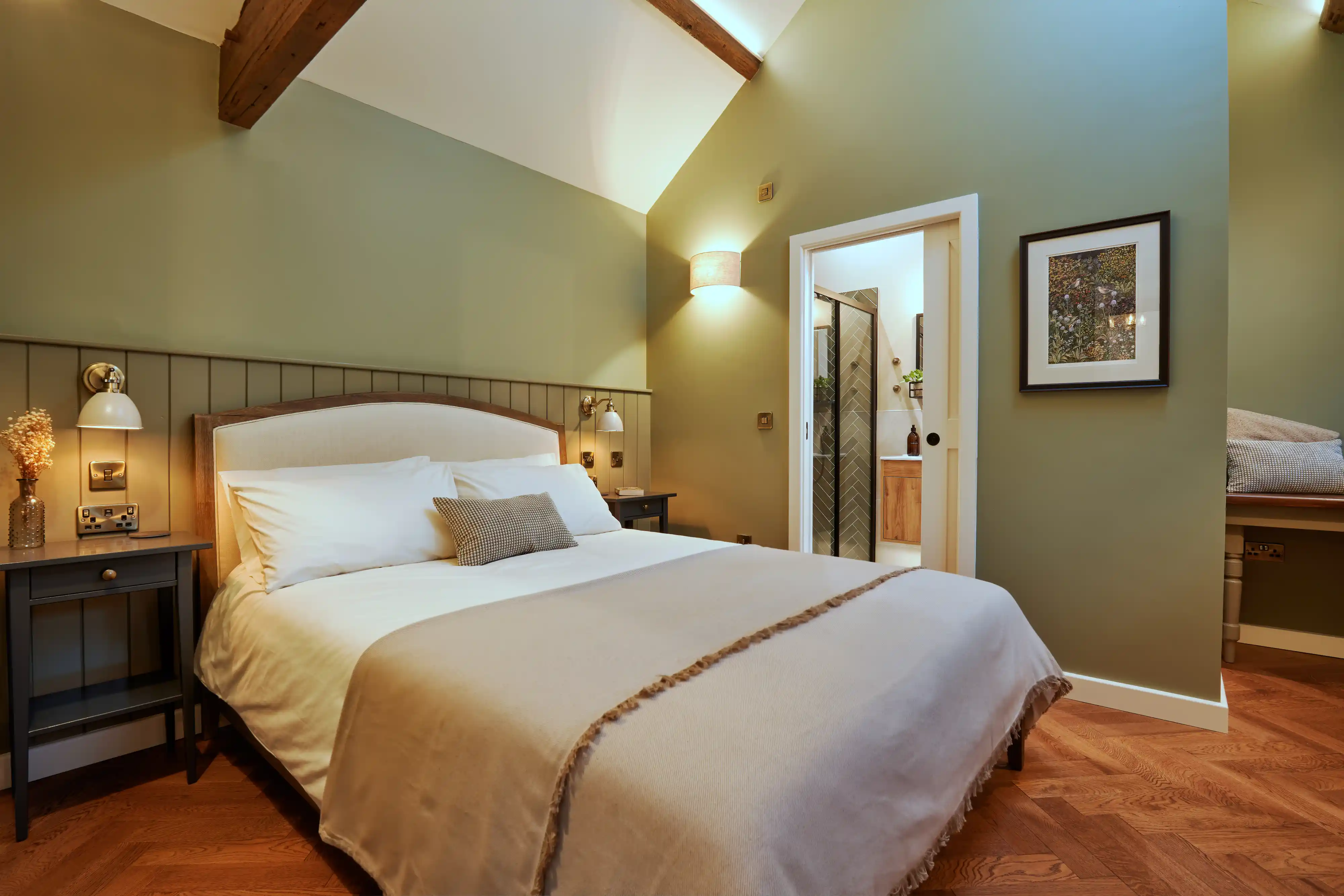 View of the bedroom with king size bed and ensuite bathroom